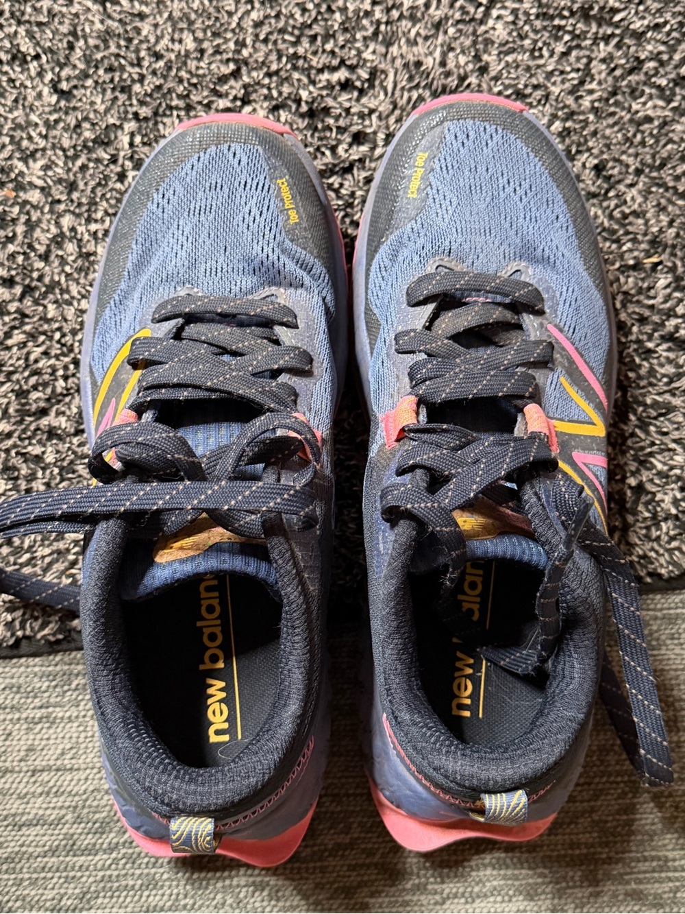 New Balance Navy Sneakers with Pink and Yellow Accents
